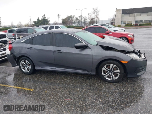2017 Honda Civic Sedan LX with VIN 19XFC2F68HE212205, listed as a IAAI auction lot 41527843 with 128,401 mi miles. Bid and sale history available at carsss.com. Image 13.
