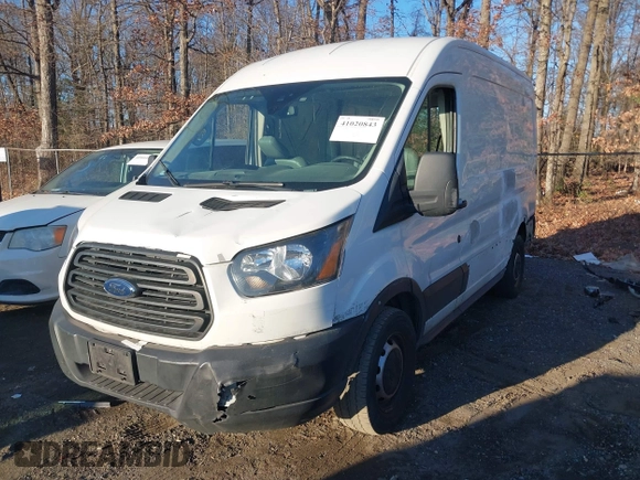 2019 Ford Transit with VIN 1FTYE1CM6KKA74930, listed as a IAAI auction lot 41020843 with 104,218 mi miles and . Bid and sale history available at DreamBid. Image 2.