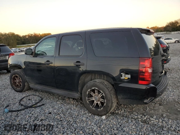 2011 Chevrolet Tahoe Commercial with VIN 1GNLC2E06BR172595, listed as a Copart auction lot 81598064 with 317,477 mi miles and Salvage title. Bid and sale history available at DreamBid. Image 2.