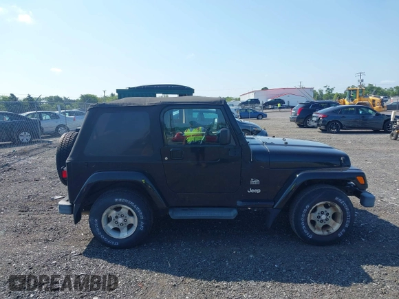 2003 Jeep Wrangler Sahara with VIN 1J4FA59S23P328003, listed as a IAAI auction lot 42833276 with 271,741 mi miles and . Bid and sale history available at DreamBid. Image 13.