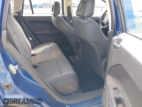 2009 Dodge Caliber SXT with VIN 1B3HB48C89D125855, listed as a IAAI auction lot 41930478 with 66,403 mi miles and . Bid and sale history available at DreamBid. Image 8.