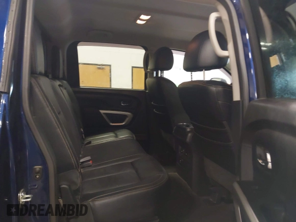 2017 Nissan Titan Pro-4X z VIN 1N6BA1F44HN551551, wystawiony jako IAAI lot #41581877 z przebiegiem 64 834 mil mil oraz . Historia ofert i sprzedaży dostępna na DreamBid. Obrazek 8.