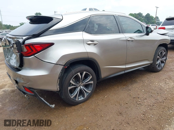 2022 Lexus RX 350 with VIN 2T2HZMAA5NC227037, listed as a IAAI auction lot 42214926 with 44,692 mi miles and . Bid and sale history available at DreamBid. Image 4.