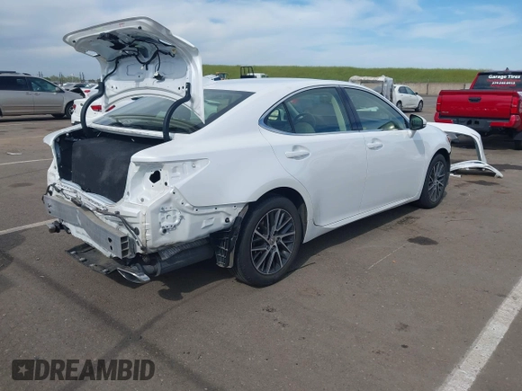 2016 Lexus ES with VIN JTHBK1GG0G2236091, listed as a IAAI auction lot 42018293 with 37,759 mi miles. Bid and sale history available at carsss.com. Image 4.