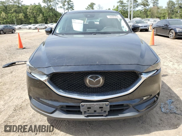 2018 Mazda CX-5 Grand Touring z VIN JM3KFADM2J1381752, wystawiony jako Copart lot #56889835 z przebiegiem 96 820 mil mil oraz Szkoda całkowita • Salvage title. Historia ofert i sprzedaży dostępna na DreamBid. Obrazek 5.