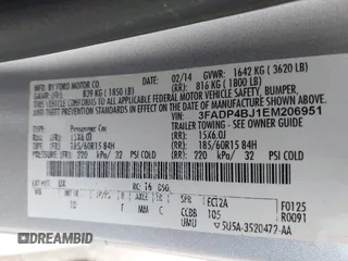 2014 Ford Fiesta SE with VIN 3FADP4BJ1EM206951, listed as a IAAI auction lot 42059193 with 174,950 mi miles. Bid and sale history available at carsss.com. Image 9.
