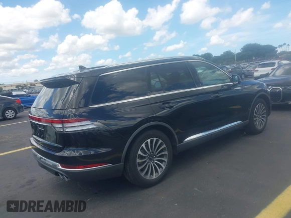 2021 Lincoln Aviator Reserve with VIN 5LM5J7WC0MGL12385, listed as a IAAI auction lot 42472422 with 20,404 mi miles and . Bid and sale history available at DreamBid. Image 4.