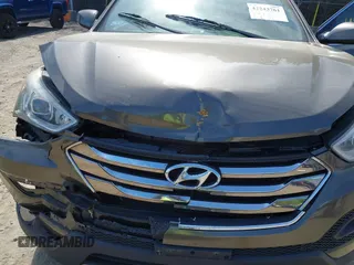 2014 Hyundai Santa Fe with VIN 5XYZTDLB2EG143925, listed as a IAAI auction lot 42243761 with 126,058 mi miles and . Bid and sale history available at DreamBid. Image 10.