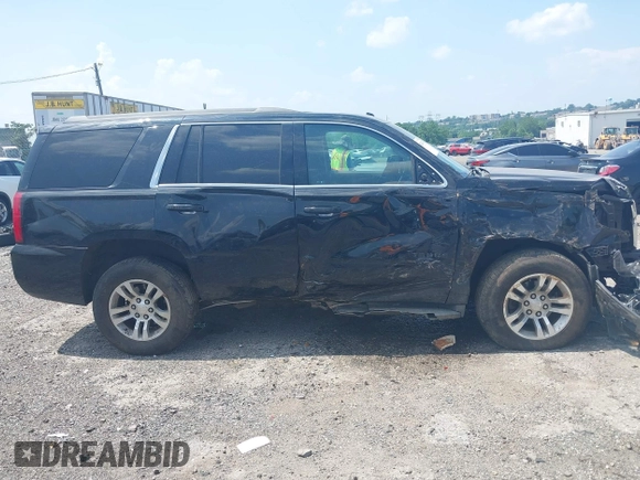 2016 Chevrolet Tahoe LS z VIN 1GNSKAKC7GR409402, wystawiony jako IAAI lot #42594767 z przebiegiem 210 315 mil mil oraz . Historia ofert i sprzedaży dostępna na DreamBid. Obrazek 13.