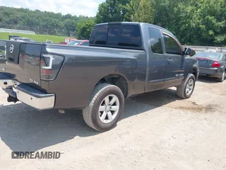 2011 Nissan Titan Pro-4X with VIN 1N6AA0CC3BN313442, listed as a IAAI auction lot 42582789 with 189,582 mi miles and . Bid and sale history available at DreamBid. Image 4.