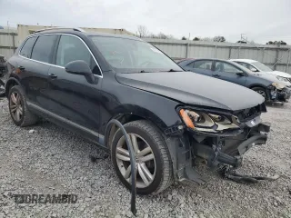 2013 Volkswagen Touareg Lux with VIN WVGEF9BP2DD006847, listed as a Copart auction lot 87613955 with 157,200 mi miles and Salvage Title. Bid and sale history available at DreamBid. Image 4.