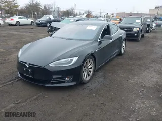 2017 Tesla Model S 100D with VIN 5YJSA1E28HF190911, listed as a IAAI auction lot 41800852 with 101,005 mi miles. Bid and sale history available at carsss.com. Image 18.
