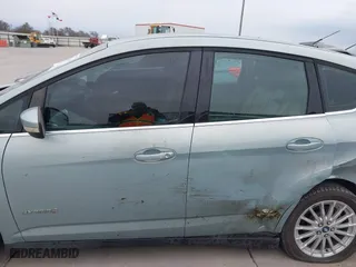 2013 Ford C-Max Hybrid SEL with VIN 1FADP5BU8DL523402, listed as a IAAI auction lot 41676386 with 214,649 mi miles. Bid and sale history available at carsss.com. Image 14.