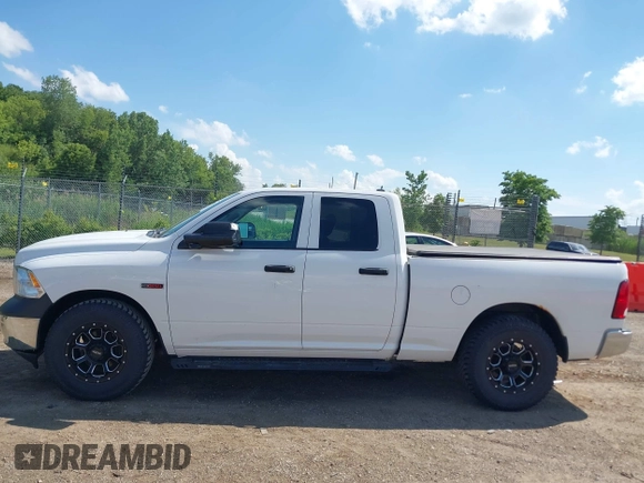 2015 Ram 1500 Tradesman z VIN 1C6RR7FM9FS544341, wystawiony jako IAAI lot #42604512 z przebiegiem 198 807 mil mil oraz . Historia ofert i sprzedaży dostępna na DreamBid. Obrazek 14.