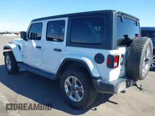 2020 Jeep Wrangler Unlimited Sahara with VIN 1C4HJXEN5LW277208, listed as a IAAI auction lot 41640906 with 61,774 mi miles. Bid and sale history available at carsss.com. Image 3.