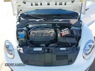 2019 Volkswagen Beetle S with VIN 3VW5DAAT0KM507437, listed as a IAAI auction lot 41380821 with 28,010 mi miles and . Bid and sale history available at DreamBid. Image 10.