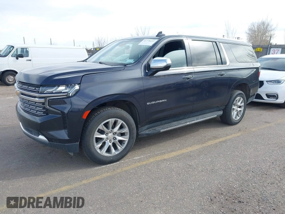 2022 Chevrolet Suburban Premier with VIN 1GNSKFKD5NR293216, listed as a IAAI auction lot 41778432 with 76,471 mi miles. Bid and sale history available at carsss.com. Image 2.