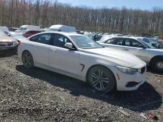2015 BMW 4 Series 428i z VIN WBA4A9C53FGL85500, wystawiony jako Copart lot #50004575 z przebiegiem 129 018 mil mil oraz Szkoda całkowita • Salvage title. Historia ofert i sprzedaży dostępna na DreamBid. Obrazek 4.