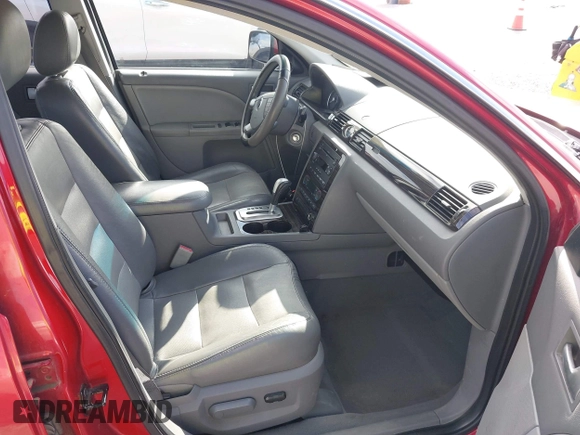2006 Mercury Montego Luxury z VIN 1MEFM40176G604402, wystawiony jako IAAI lot #42343233 z przebiegiem 148 284 mil mil oraz . Historia ofert i sprzedaży dostępna na DreamBid. Obrazek 5.