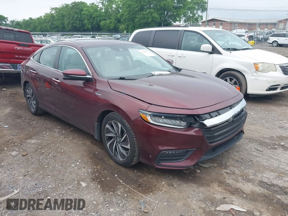2020 Honda Insight Touring z VIN 19XZE4F93LE010040, wystawiony jako IAAI lot #42240572 z przebiegiem 52 299 mil mil oraz . Historia ofert i sprzedaży dostępna na DreamBid. Obrazek 1.