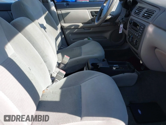 2006 Ford Taurus SE with VIN 1FAFP53U66A206014, listed as a IAAI auction lot 42045047 with 65,326 mi miles. Bid and sale history available at carsss.com. Image 5.