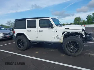 2020 Jeep Wrangler Unlimited Sport S with VIN 1C4HJXDN6LW198065, listed as a IAAI auction lot 42049279 with 72,512 mi miles. Bid and sale history available at carsss.com. Image 13.