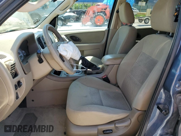 2006 Ford Escape XLT with VIN 1FMYU03146KA43518, listed as a Copart auction lot 61831445 with 191,612 mi miles and Salvage title. Bid and sale history available at DreamBid. Image 7.