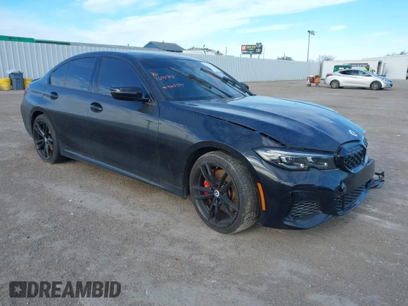 2022 BMW 3 Series M340i xDrive with VIN WBA5U9C08NFM68599, listed as a IAAI auction lot 41260340 with Not Provided miles and . Bid and sale history available at DreamBid. Image 1.