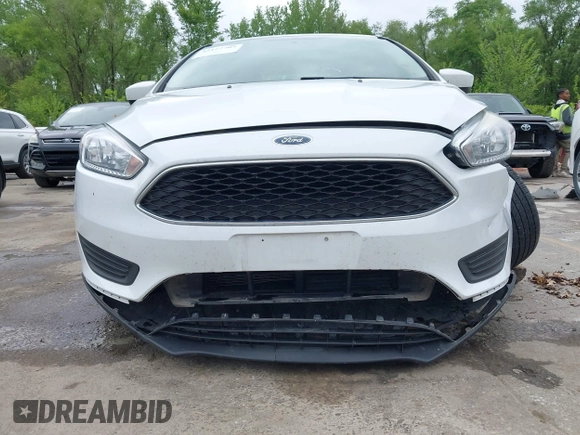 2018 Ford Focus SE with VIN 1FADP3F29JL223389, listed as a IAAI auction lot 42127707 with 87,145 mi miles and . Bid and sale history available at DreamBid. Image 12.