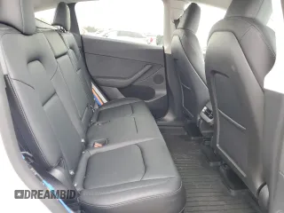 2025 Tesla Model Y Long Range with VIN 7SAYGDED5SF241318, listed as a Copart auction lot 51614245 with 3,682 mi miles and Salvage Title. Bid and sale history available at DreamBid. Image 10.