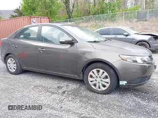 2010 Kia Forte EX with VIN KNAFU4A23A5847814, listed as a IAAI auction lot 42048432 with 97,678 mi miles. Bid and sale history available at carsss.com. Image 6.