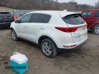 2018 Kia Sportage LX with VIN KNDPM3AC4J7315826, listed as a IAAI auction lot 41521362 with 130,628 mi miles and . Bid and sale history available at DreamBid. Image 3.
