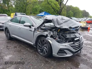 2023 Volkswagen Arteon SEL R-Line z VIN WVWAR7ANXPE010870, wystawiony jako IAAI lot #42246798 z przebiegiem 26 587 mil mil oraz . Historia ofert i sprzedaży dostępna na DreamBid. Obrazek 6.