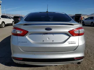2013 Ford Fusion Titanium Hybrid with VIN 3FA6P0RU5DR321121, listed as a Copart auction lot 77019974 with 160,361 mi miles and Salvage Title. Bid and sale history available at DreamBid. Image 6.