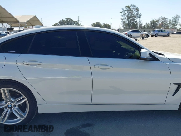 2015 BMW 4 Series 428i with VIN WBA4A9C50FGL85857, listed as a IAAI auction lot 42542619 with 136,411 mi miles and . Bid and sale history available at DreamBid. Image 14.
