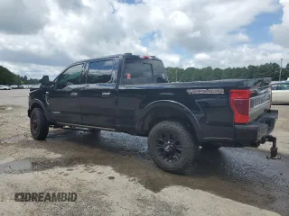 2021 Ford F-250 XL with VIN 1FT8W2BT6MEC26458, listed as a Copart auction lot 60745865 with 103,527 mi miles and Salvage title. Bid and sale history available at DreamBid. Image 2.