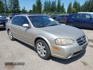 2002 Nissan Maxima GXE z VIN JN1DA31D92T207069, wystawiony jako IAAI lot #42439722 z przebiegiem 188 502 mil mil oraz . Historia ofert i sprzedaży dostępna na DreamBid. Obrazek 1.