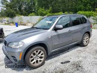 2012 BMW X5 35i с VIN 5UXZV4C50CL991452, выставлен на аукционе Copart как лот 56890265 с пробегом 147 019 миль миль и Списание • Salvage title. История ставок и продаж доступна на DreamBid. Изображение 1.