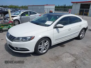 2014 Volkswagen CC Executive z VIN WVWRP7AN7EE537318, wystawiony jako IAAI lot #42308532 z przebiegiem 217 059 mil mil oraz . Historia ofert i sprzedaży dostępna na DreamBid. Obrazek 2.