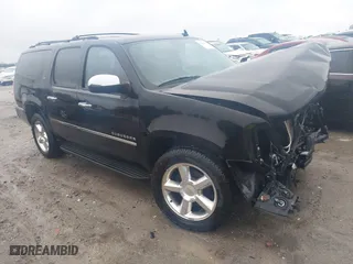 2012 Chevrolet Suburban LTZ with VIN 1GNSKKE74CR221161, listed as a IAAI auction lot 41543212 with 307,235 mi miles. Bid and sale history available at carsss.com. Image 1.
