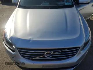 2015 Volvo XC60 z VIN YV4940RA8F2609421, wystawiony jako Copart lot #86134784 z przebiegiem 20 214 mil mil oraz Szkoda całkowita • Salvage title. Historia ofert i sprzedaży dostępna na DreamBid. Obrazek 12.