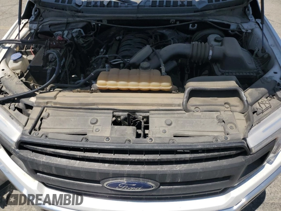 2018 Ford F-150 XL z VIN 1FTEX1C52JKE31993, wystawiony jako Copart lot #54867525 z przebiegiem 121 290 mil mil oraz Szkoda całkowita • Salvage title. Historia ofert i sprzedaży dostępna na DreamBid. Obrazek 11.