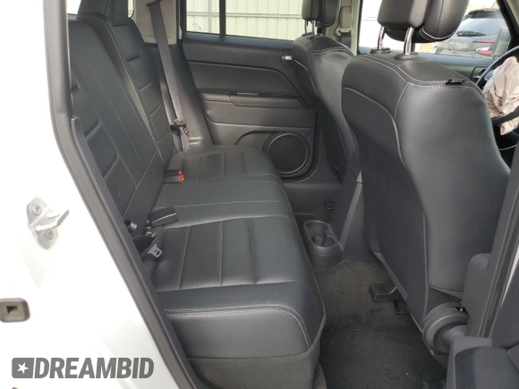 2016 Jeep Patriot High Altitude with VIN 1C4NJRFB4GD627111, listed as a Copart auction lot 63730615 with 73,208 mi miles and Salvage title. Bid and sale history available at DreamBid. Image 11.