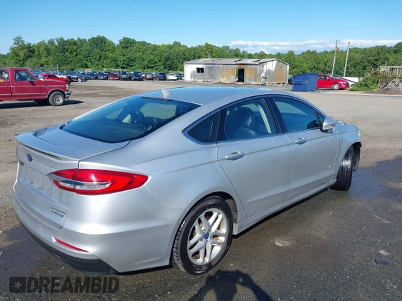 2019 Ford Fusion Titanium with VIN 3FA6P0RUXKR141565, listed as a IAAI auction lot 42323999 with 206,397 mi miles and . Bid and sale history available at DreamBid. Image 4.