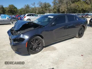2018 Dodge Charger SXT with VIN 2C3CDXBG8JH147785, listed as a Copart auction lot 48533645 with 216,301 mi miles and Salvage Title. Bid and sale history available at DreamBid. Image 1.