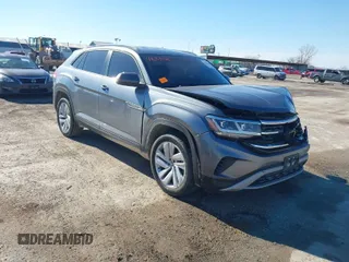 2021 Volkswagen Atlas SE z VIN 1V2WE2CA1MC202537, wystawiony jako IAAI lot #41633586 z przebiegiem 92 252 mil mil oraz . Historia ofert i sprzedaży dostępna na DreamBid. Obrazek 1.