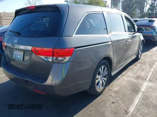 2015 Honda Odyssey EX-L with VIN 5FNRL5H61FB126933, listed as a IAAI auction lot 42003978 with 69,025 mi miles and . Bid and sale history available at carsss.com. Image 4.