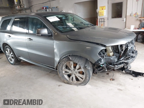 2012 Dodge Durango R/T z VIN 1C4SDJCT2CC169951, wystawiony jako IAAI lot #42012202 z przebiegiem 278 670 mil mil oraz . Historia ofert i sprzedaży dostępna na DreamBid. Obrazek 1.