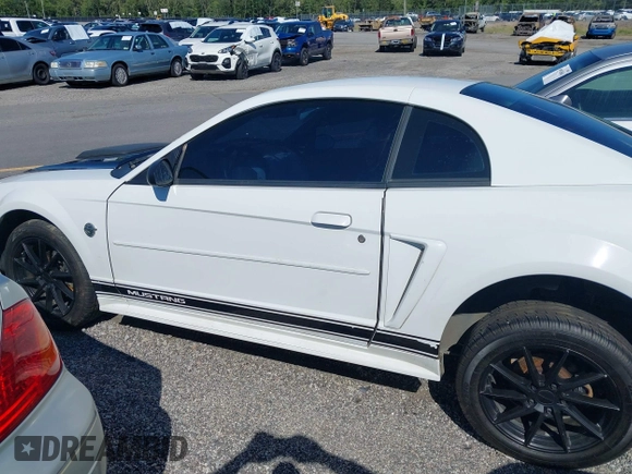 2004 Ford Mustang Standard z VIN 1FAFP40654F229283, wystawiony jako IAAI lot #42309648 z przebiegiem 164 610 mil mil oraz . Historia ofert i sprzedaży dostępna na DreamBid. Obrazek 15.