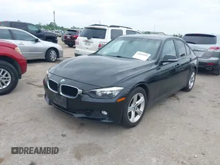 2013 BMW 3 Series 328i with VIN WBA3A5C53DF351967, listed as a IAAI auction lot 42025391 with 127,108 mi miles and . Bid and sale history available at carsss.com. Image 2.